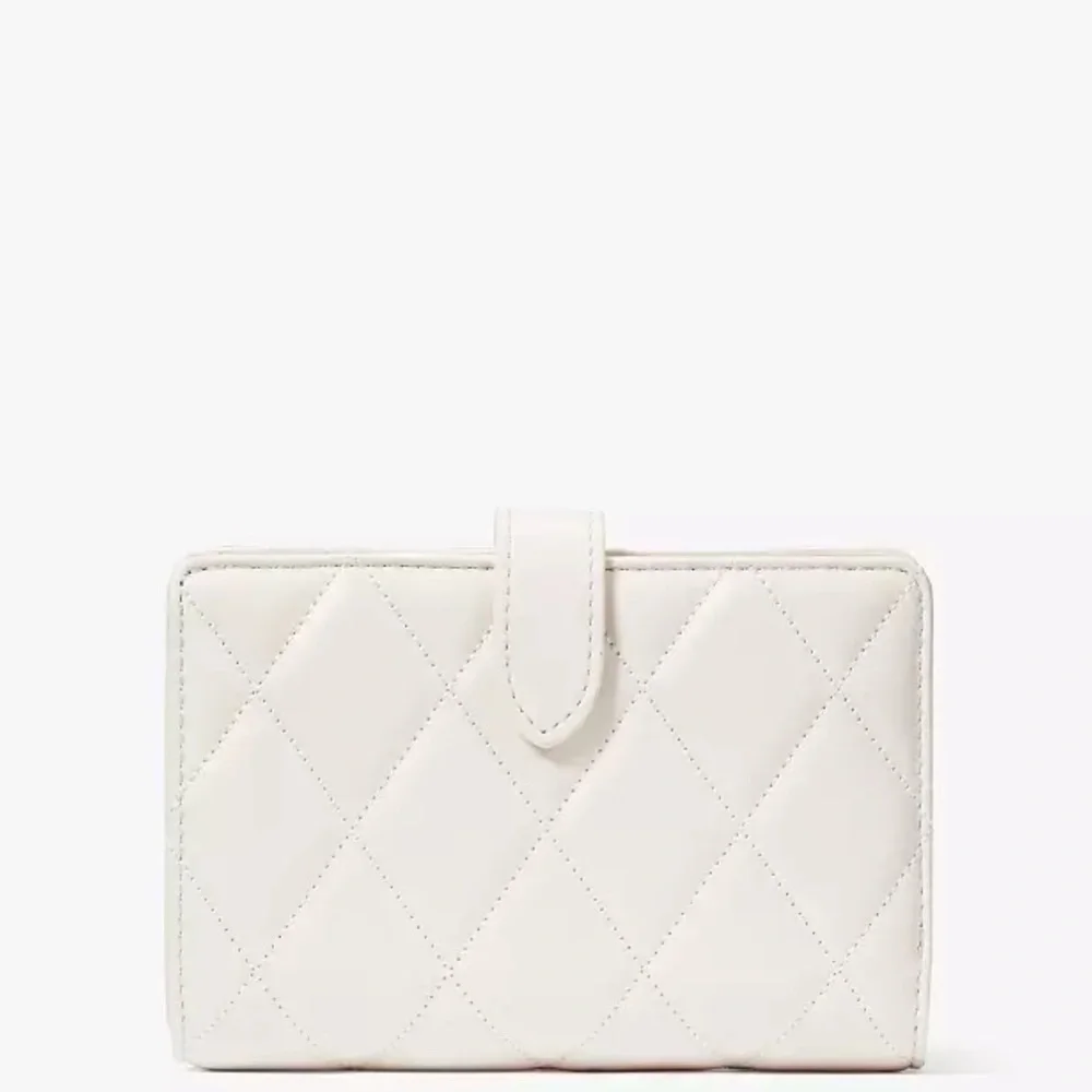 KATE SPADE Carey Medium Compact Bifold Wallet Parchment Color